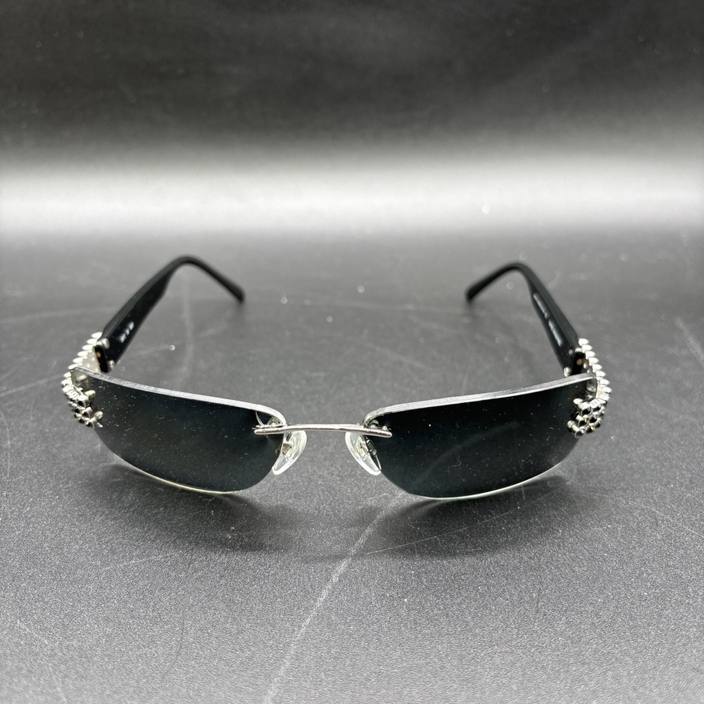 Daniel Swarovski S572 00 6051 23 Kt GP Gold Black Frameless Sunglasses Read